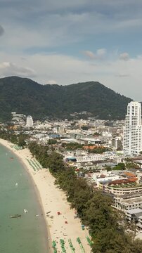 sunny day phuket island famous patong beach town aerial panorama 4k vertical timelapse thailand