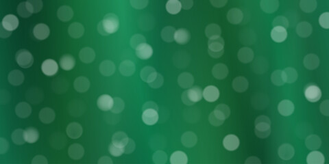 Abstract green bokeh background with soft focus circle lights and natural emerald tones.