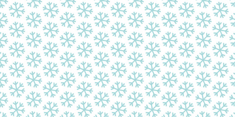 Blue seamless floral pattern with star and snowflake design for a winter holiday wallpaper