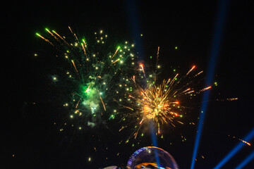 Amazing firework explosion in the night sky 	