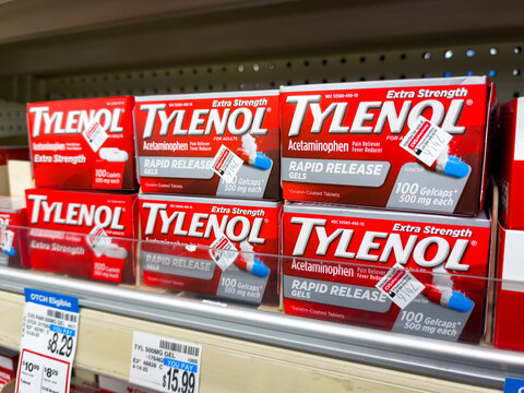 Small cartons boxes containing plastic bottles of TYLENOL Extra Strength Pain Reliever Capsules for sale at a California local pharmacy store	