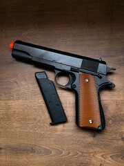 Toy weapon with a wooden handle