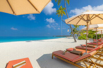 Beautiful panoramic sea sand sky. Tropical relax beach sunny summer island landscape. Love couple chairs umbrella palm leaves romantic coast. Luxury travel destination. Honeymoon vacation best holiday
