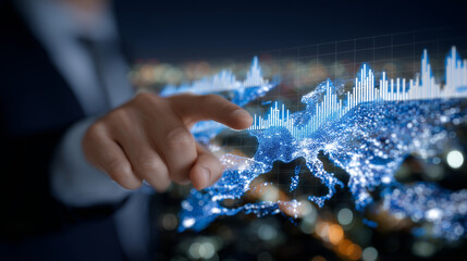 Close-up of hands pointing to a touchscreen display with animated graphs of rare earth mineral flows, office interior and sunlight reflections adding realism