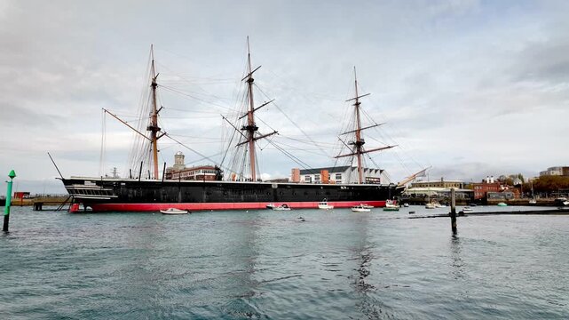 HMS Warrior, seen from the shore near the dockyard. Sunshine