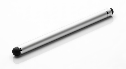 Silver stylus pen with black rubber tip resting on a white reflective surface with subtle shadow metallic