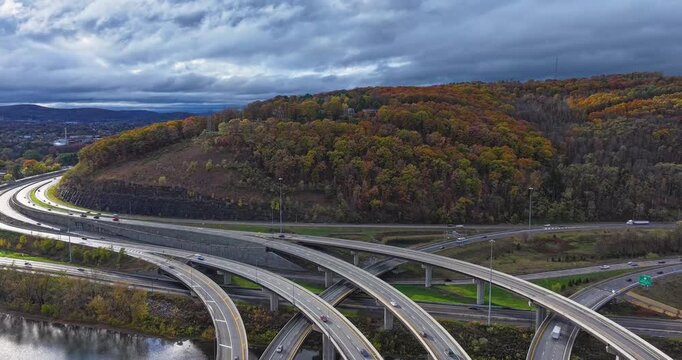 Fall afternoon aerial hyper lapse video of the Interstate 81 and Route 17 interchange north of Binghamton, NY.