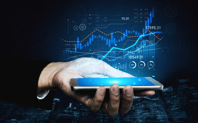 A realistic depiction of a hand holding a smartphone, displaying vibrant financial graphs and data...