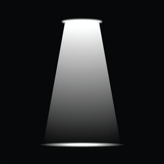 A bright spotlight illuminating from above a dark background. The light beam creates a sense of focus and attention
