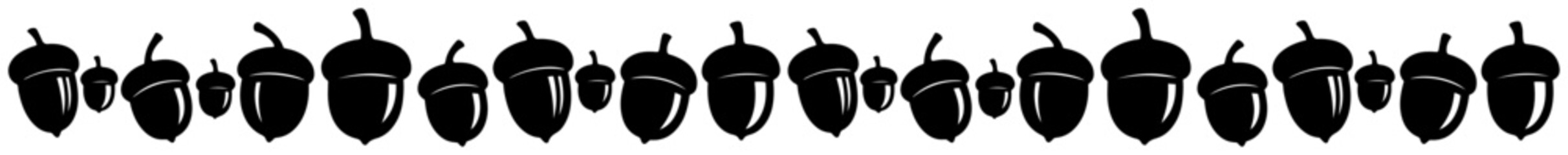 Fototapeta premium Seamless border of repeating acorn silhouettes – rustic autumn divider design