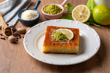 Revani - traditional Turkish dessert and pistachio paste sweet.