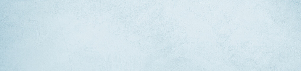 Light blue mint white concrete cement wall grungy surface texture background. Pale soft pastel shade. Painted plaster. Simple minimal. Blank empty template design. Christmas winter cold. Wide banner. 