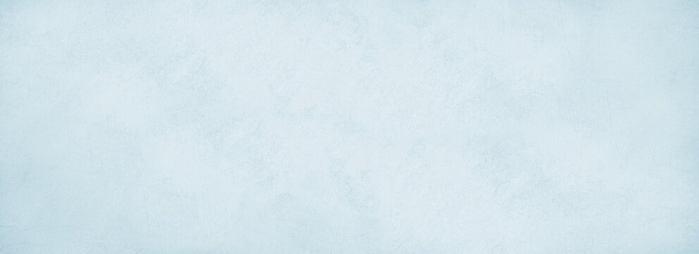 Light blue mint white concrete cement wall grungy surface texture background. Pale soft pastel shade. Painted plaster. Simple minimal. Blank empty template design. Christmas winter cold. Wide banner. 
