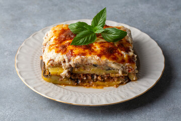 Traditional Greek potato and meat casserole with cheese - moussaka