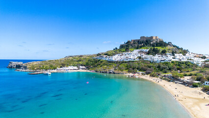 Rhodes, Greece. Lindos small whitewashed village and the Acropolis, scenery of Rhodos Island at...