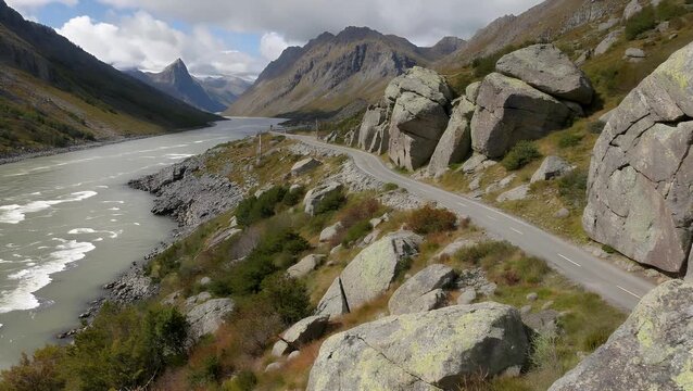 pathway for vehicular traffic traversing a rugged geological landscape characterized by large igneous rock formations  captured from an elevated unmanned aerial vehicle