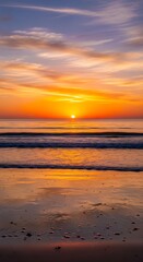 Vibrant Sunset Over Ocean Waves Reflecting on Wet Beach Sand.