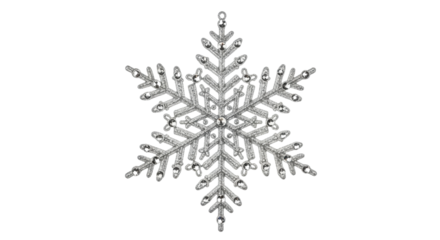Intricate silver snowflake on black background: winter holiday decoration