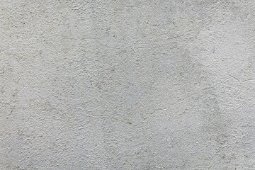 Clean white plaster wall showing fine texture and subtle surface detail. Neutral minimalist background suitable for mockups, architecture, or design projects