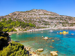 Obraz premium Experience breathtaking coastal views with clear blue waters and mesmerizing scenic hills
