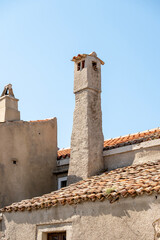 Old chimney on the native, mediterranean house in the village of Lubenice, Croatia on wonderful Cres island