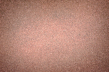 Brown defocused glitter background with thin focus part and defocused main part.