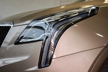 Close up of a cars headlight, part of automotive design