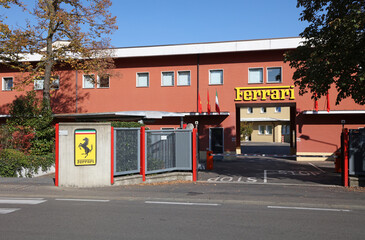 Naklejka premium Maranello, Modena, Italy - Oct 17, 2025: The Ferrari headquarters in Maranello. Ferrari is a luxury sports car manufacturer and F1 racing company.