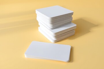 Fototapeta premium Generative AI blank cards in stacks and single on yellow background.