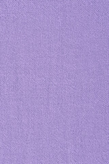 Purple fabric texture macro photo as background.