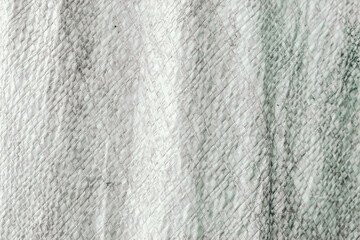 grayish white woven plastic sack texture