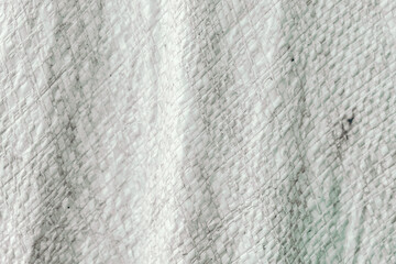 grayish white woven plastic sack texture