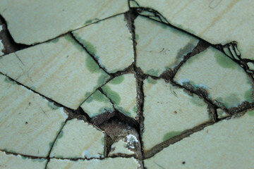 marble texture cracked and broken due to damage to the floor