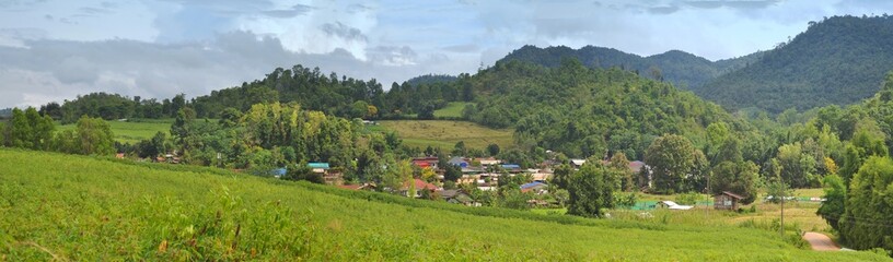 Fototapeta premium panoramic view of village in the mountains