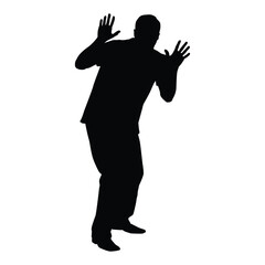 Silhouette of a man reacting with both hands up, possibly in fear, shock, or surprise. Ideal for concepts of panic, danger, protection, stop signal, or unexpected events.