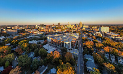Obraz premium Aerial Drone Images of Downtown Raleigh North Carolina Skyline at Golden Hour: Travel, Architecture, Cityscape, Business, Real Estate