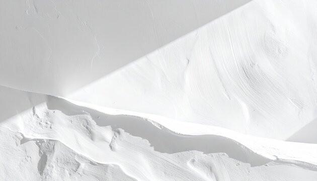 Macro View of Textured White Surface with Dramatic Top Down Lighting and Shadow Play Revealing Subtle Ripples and Geometric Shapes