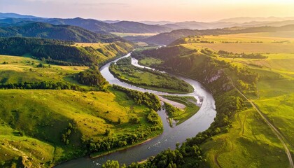 Golden Hour Serenity A Meandering River Winds Through Lush Green Rolling Hills Under a Softly Lit Sky in Rural Landscape
