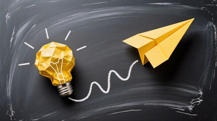 A yellow origami light bulb and paper airplane on a chalkboard, symbolizing innovation turning ideas into action.
