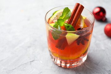 Tasty punch drink on light table, closeup with space or text. Christmas season