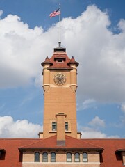Union Train Station Clock Tower, Springfield Illinois, Historic Landmark with Blue Sky and American flag