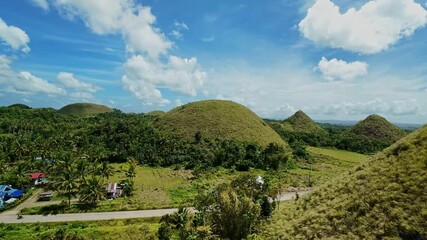 Scenic view of Chocolate Hills and lush greenery in Bohol Philippines Scenic view of Chocolate Hills and lush greenery in Bohol Philippines