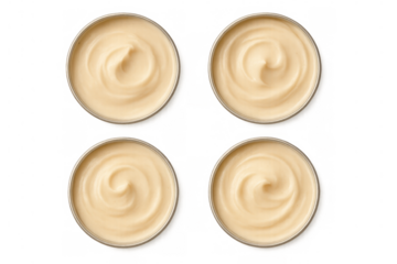 Cosmetic cream jars set with textured swirls, clear glass moisturizer packaging, top view on transparent background