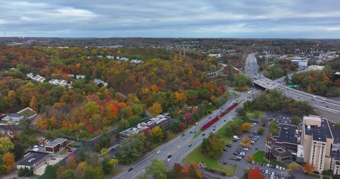 Fall afternoon aerial video over Interstate 87, 287,  Elmsford, NY in Westchester County.