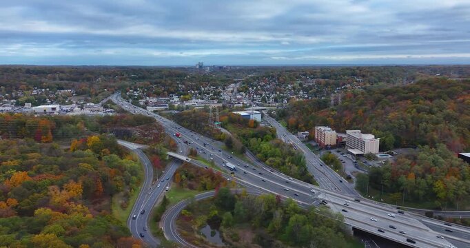 Fall afternoon aerial video over Interstate 87, 287,  Elmsford, NY in Westchester County.
