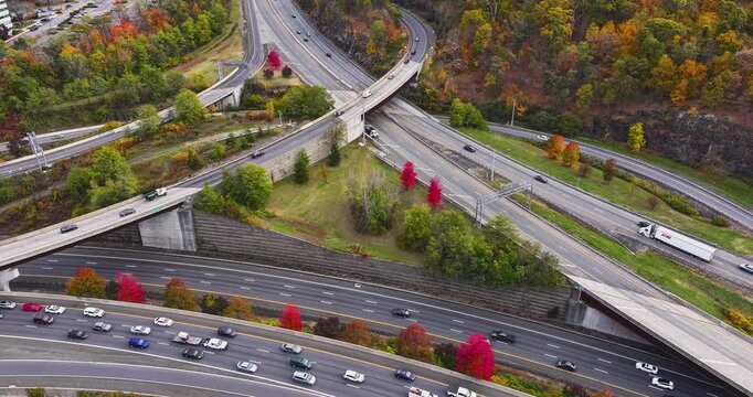 Fall afternoon aerial hyper lapse video over Interstate 87, 287,  Elmsford, NY in Westchester County.
