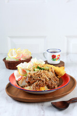 Ketoprak Tahu, Rice Cake, Tofu, Bean Sprouts, and Vermicelli with Peanut Sauce Dressing