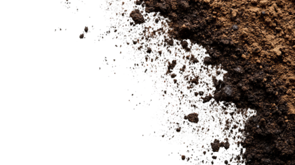 Close-up shot showing a pile of dark brown earth against a solid black background