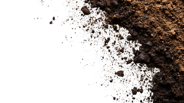 Close-up shot showing a pile of dark brown earth against a solid black background