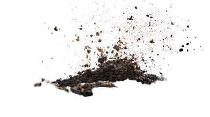 Brown granular explosion against black. Bits of light, dark, and vibrant colors